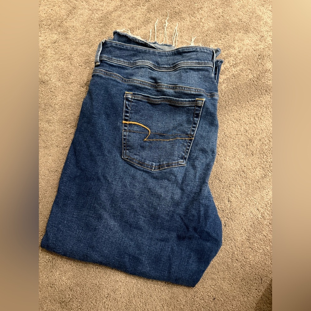 AE kick boot ripped jeans